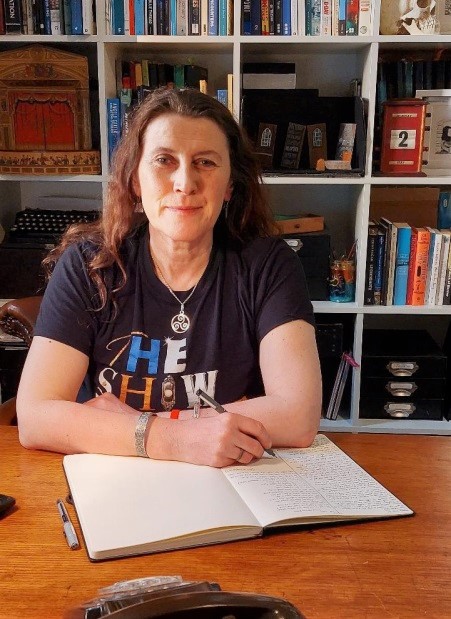 Áine King in her element Áine King is a London-Irish writer, storyteller and award-winning dramatist currently living in Orkney in the historic Highland Park House. She has an upcoming book with Orkneyology Press.