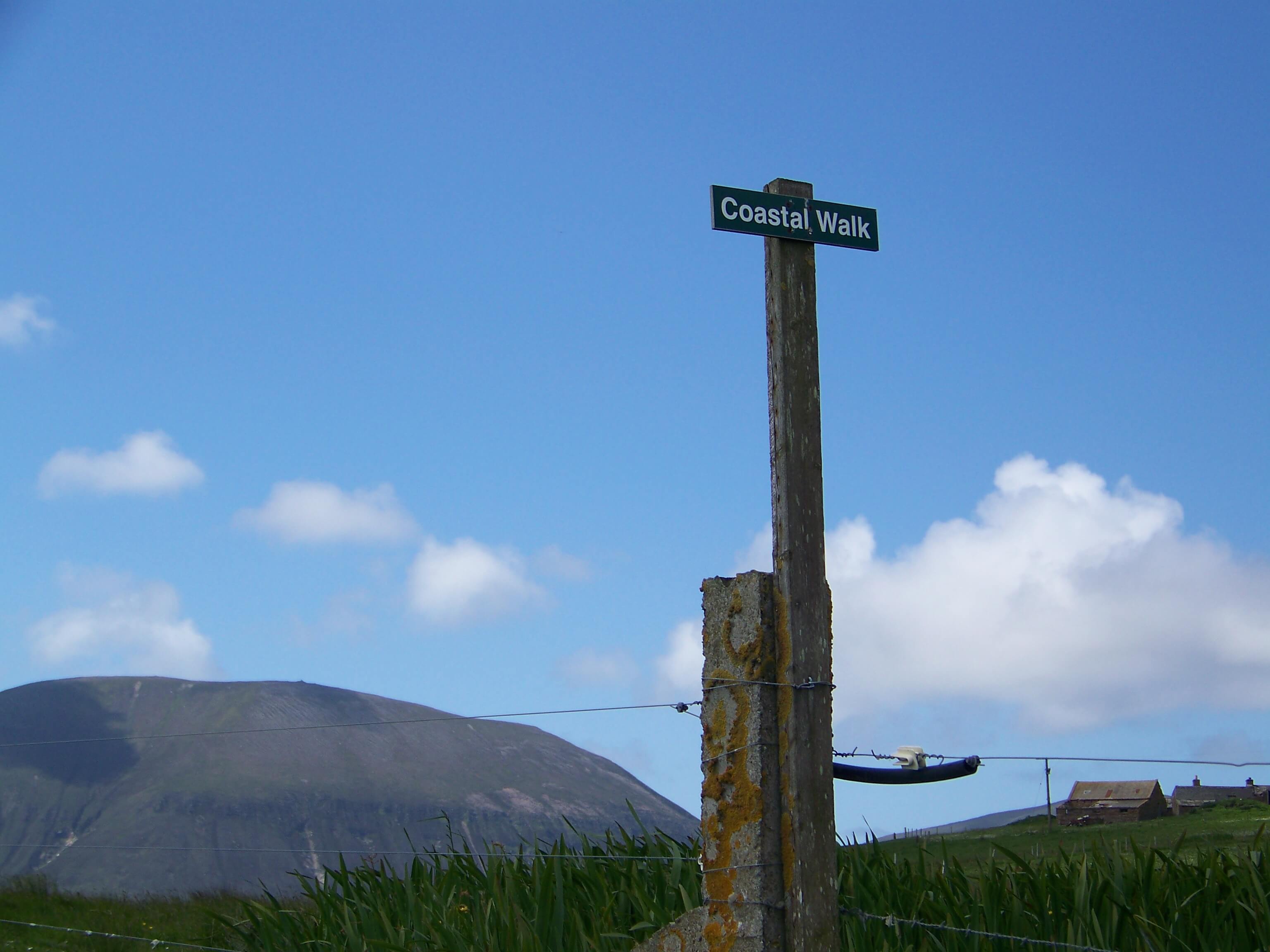 Well-marked coastal walk path Coastal walk sign, Orkney island