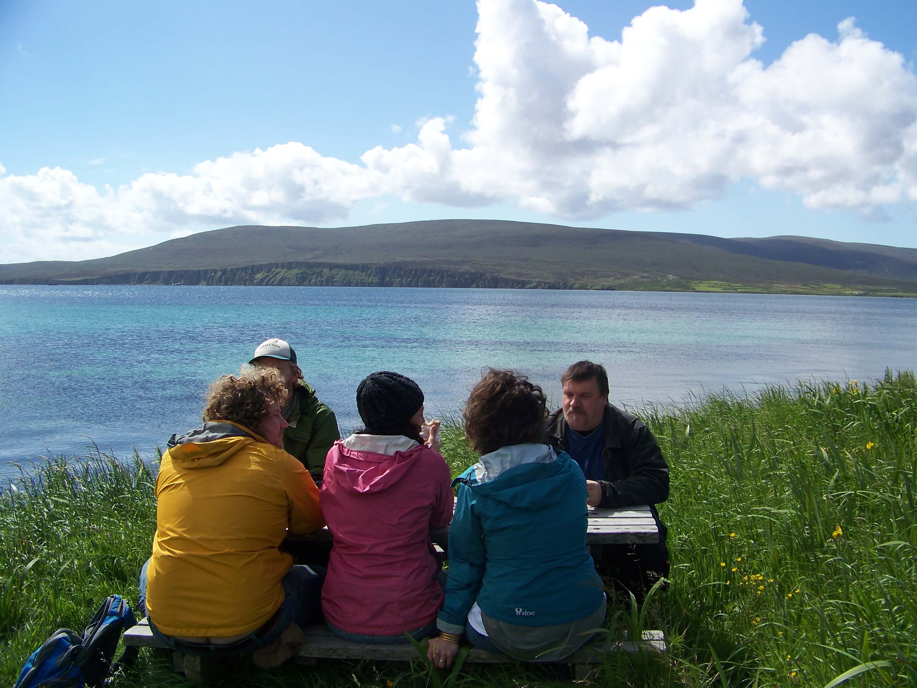 Taking nourishment for the upcoming hike at a conveniently-located picnic table Picnic lunch on an Orkney island