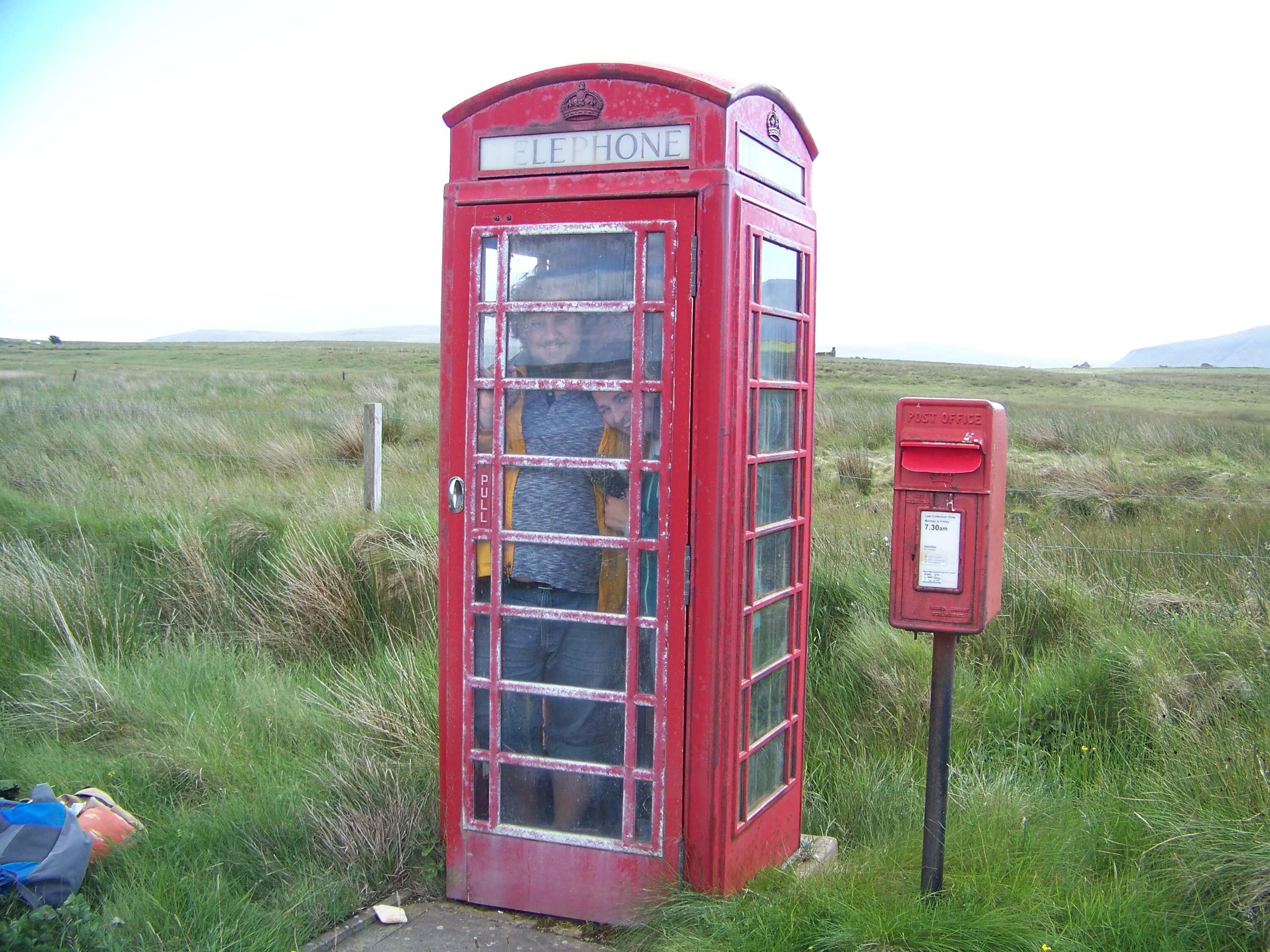 Looks a bit tight in there Red phone booth, Orkney island