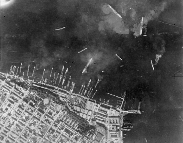 Taranto, Italy. 1940. Aerial view showing aftermath of action against the Italian Fleet in Taranto Harbour. Taranto, Italy. 1940. Aerial view showing aftermath of action against the Italian Fleet in Taranto Harbour.