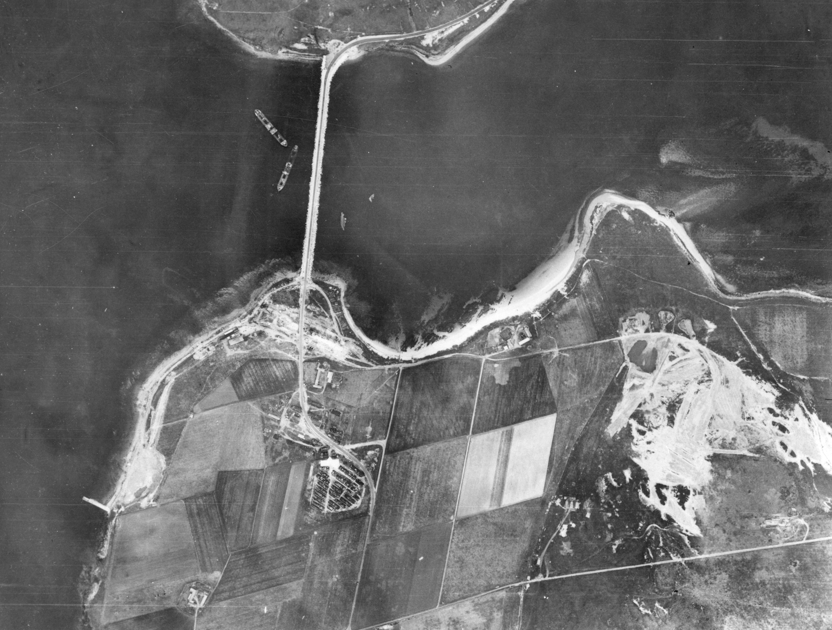 Glimps Holm is at the top of the photo, with Camp 34 on Burray at the bottom. Churchill Barrier no. 3 showing. WWII Orkney Islands, Scotland. Glimps Holm is at the top of the photo, with Camp 34 on Burray at the bottom. Churchill Barrier no. 3 showing.#Orkneyology.com