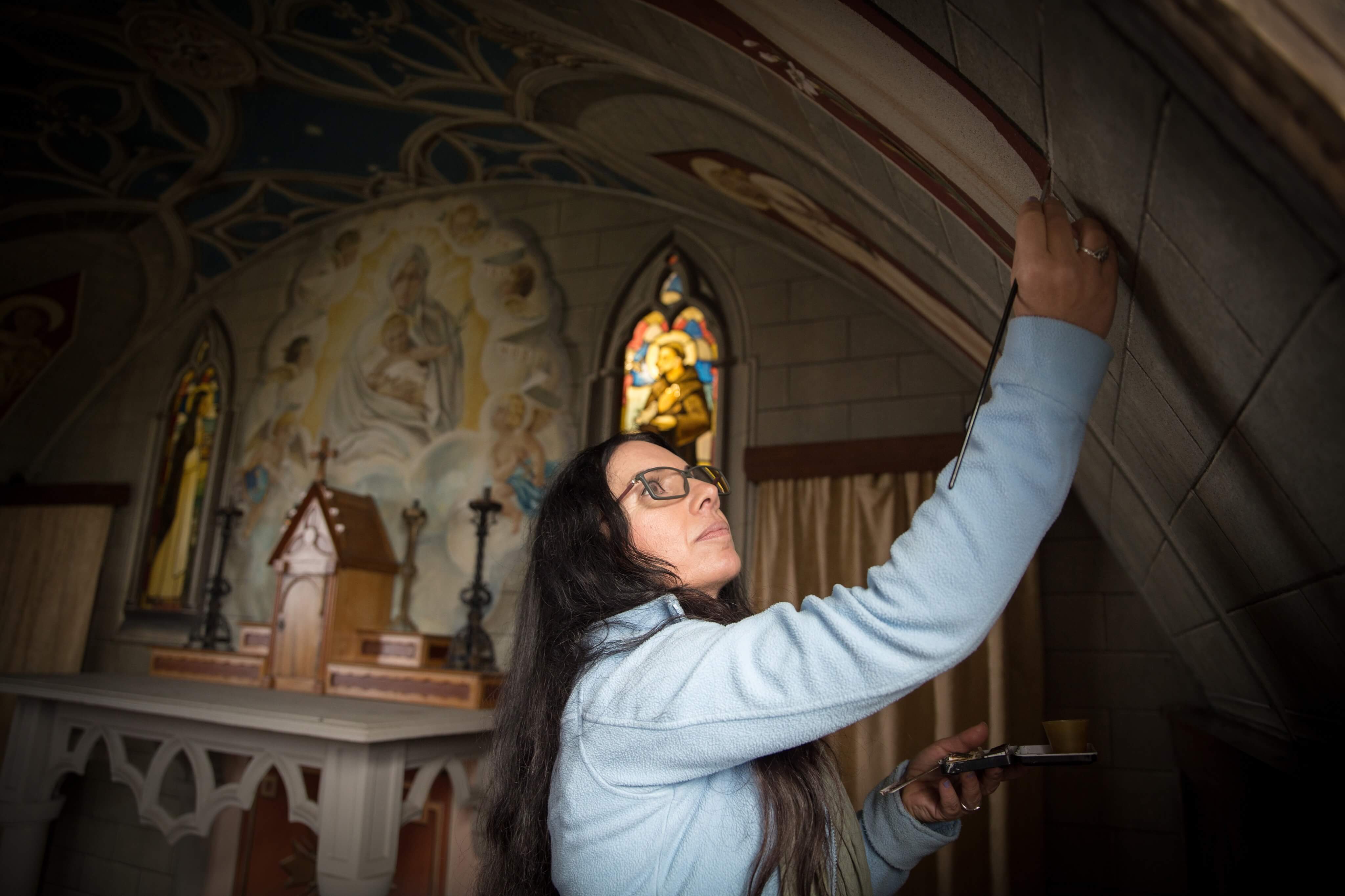 Professional conservator and art restorer Antonella Papa of Rome, Italy - working on Italian Chapel restoration in Scotland's Orkney Islands. www.Orkneyology.com