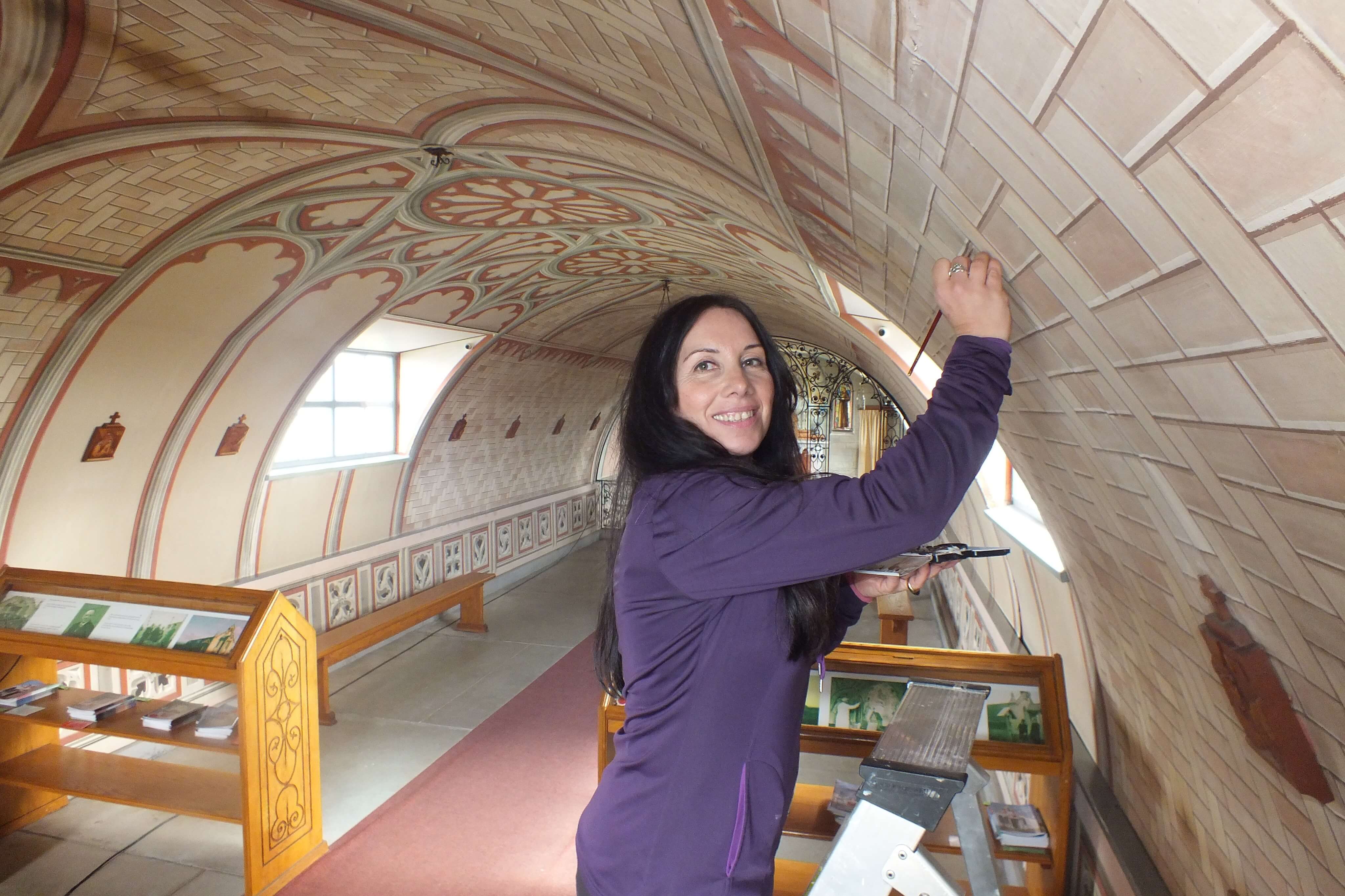 Professional conservator and art restorer Antonella Papa of Rome, Italy - working on chapel restoration in the Italian POW chapel on Lamb Holm in Scotland's Orkney Islands. www.Orkneyology.com