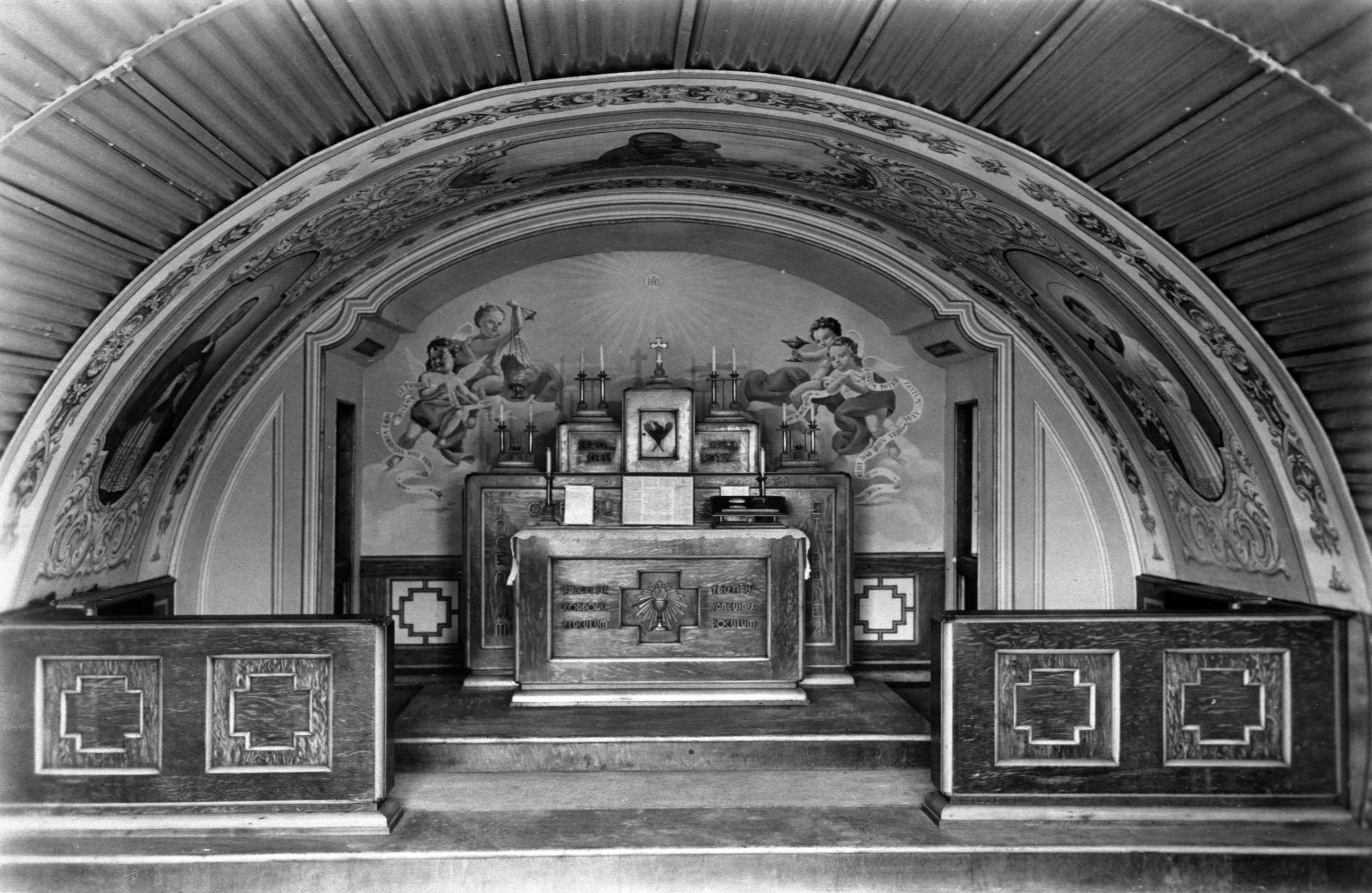 The simpler Italian Chapel in Burray, only an alter. The artwork was done by Penici, who made the head of Christ at the Lamb Holm chapel. Camp life on Lamb's Holm for Italian POWs in the Orkney Islands, Scotland. www.Orkneyology.com