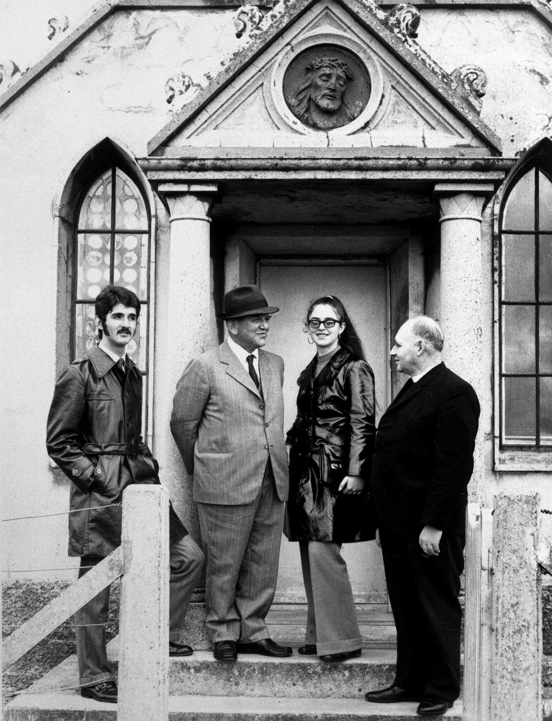 Chiocchetti and his family: Fabio, Domenico, Letizia, Father Bamber. Domenico Chiocchetti, former Italian POW in the Orkney Islands, Scotland, re-visits his chapel in Lamb's Holm, Orkney with his family. www.Orkneyology.com