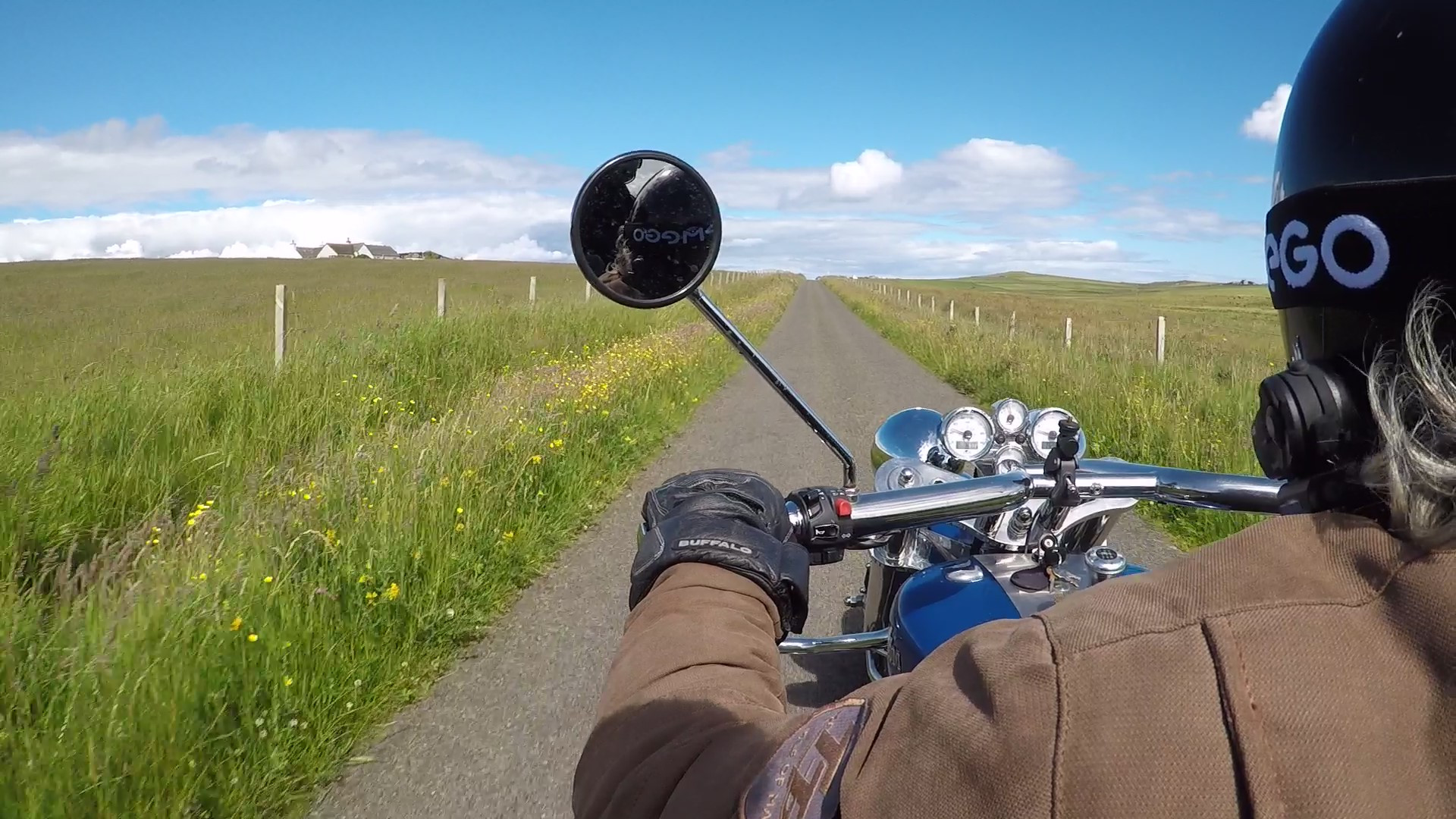 Go for a ride with John! John Foster's Trike Tours, taking a guest for a Scottish island tour. Orkneyology.com