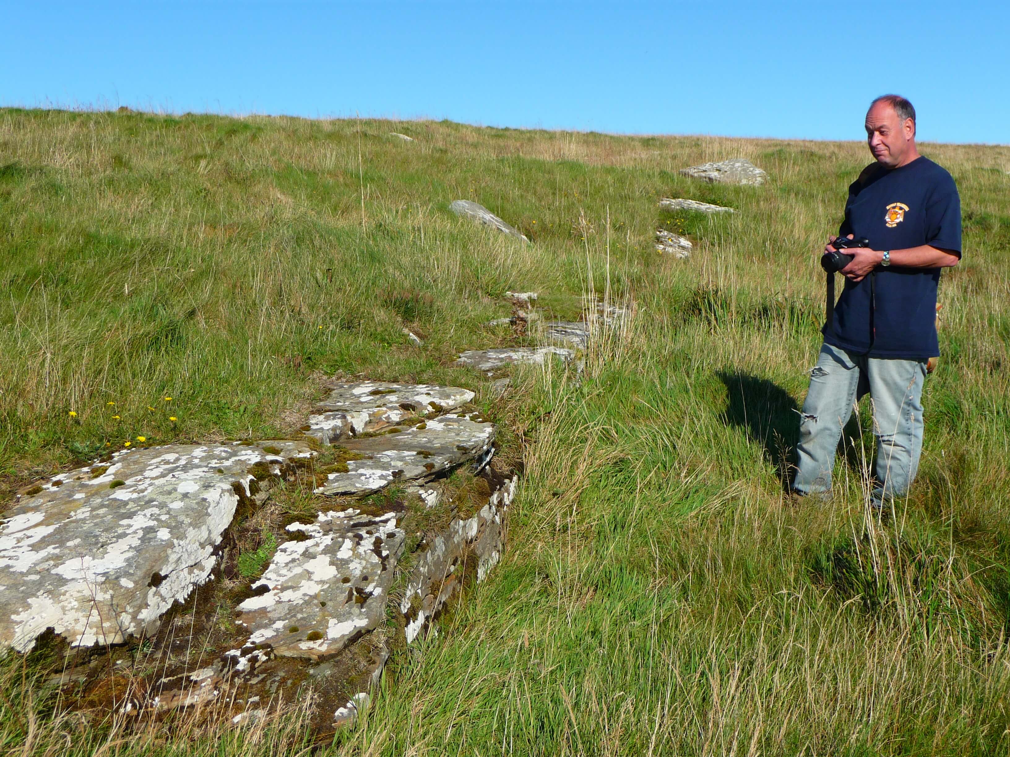 Colin at the quarry site, Vestrafiold Archaeologist Colin Richards at Vestrafiold where Neolithic builders quarried stone for the standing stones at Brodgar. www.Orkneyology.com