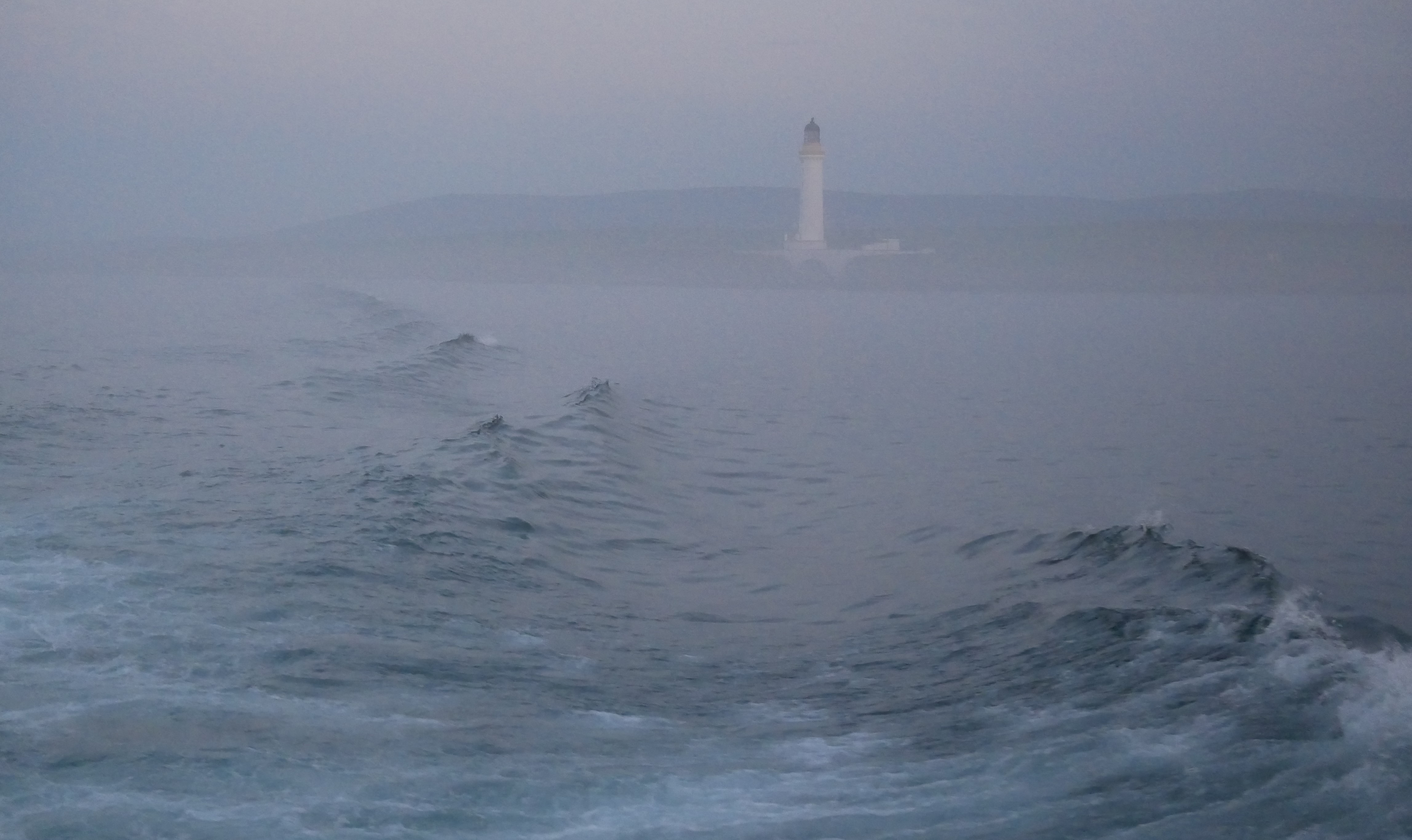 Hoy High lighthouse looking mysterious Hoy High light house, Graemsay, Orkney Islands, Scotland, UK
