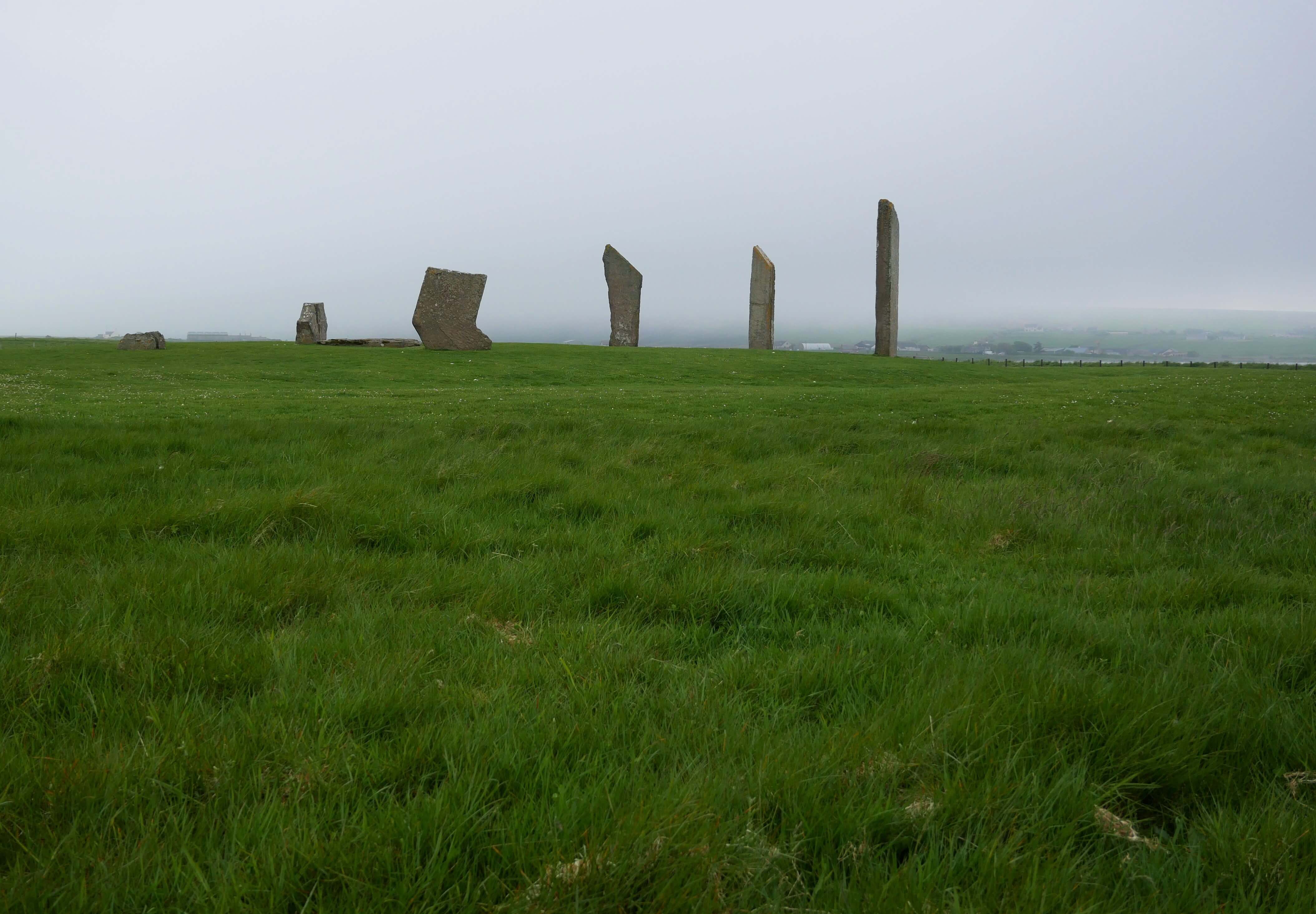 Giants in the mist The standing stone circle at Stenness Loch, Orkney Islands, Scotland, UK. Orkneyology.com