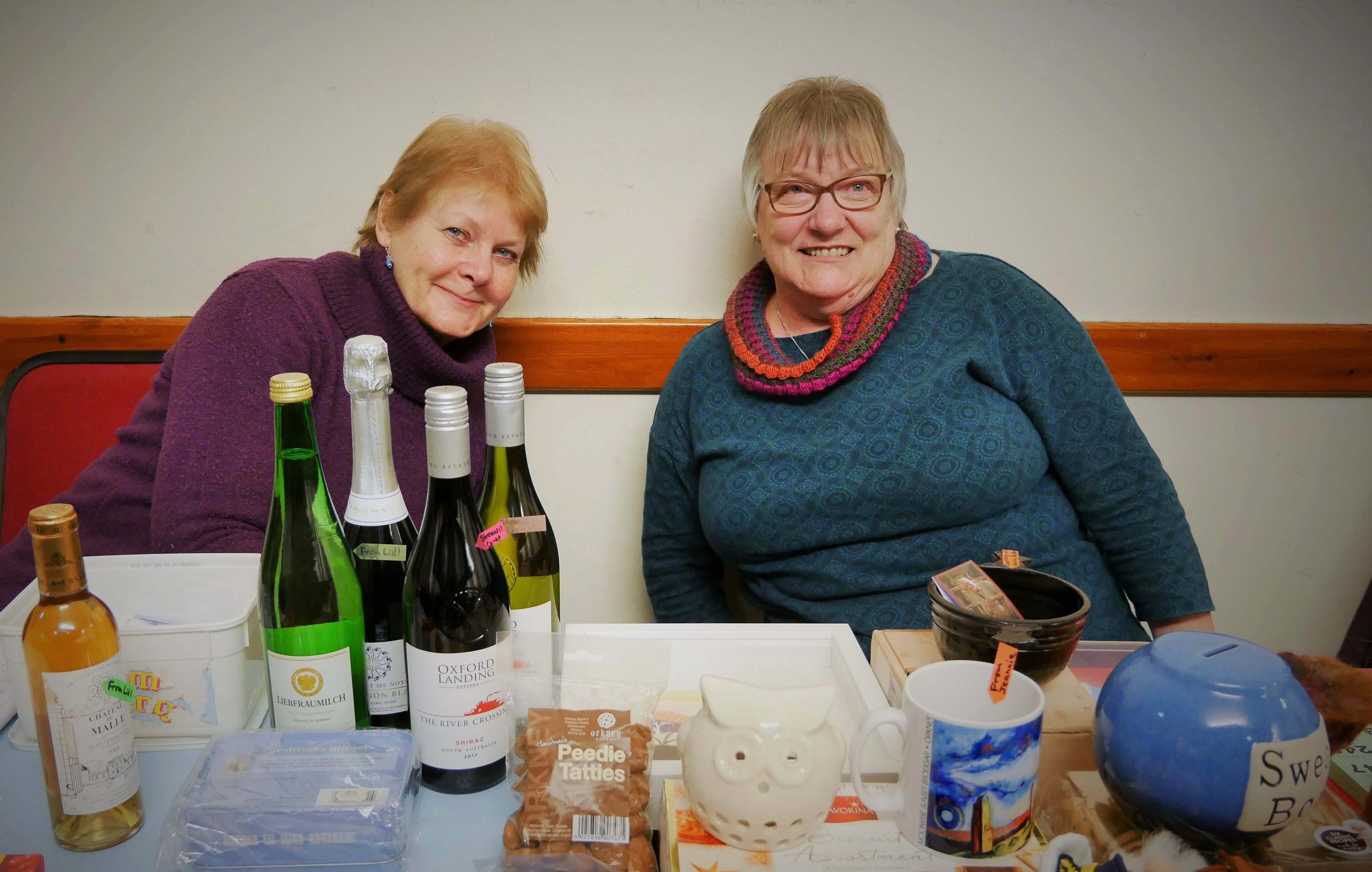 Two of our broonies helping out at the festival: Sheila Faichney, who helped start the Orkney Storytelling Festival, and Meggie Tulloch, wife of Shetland storyteller Lawrence Tulloch.