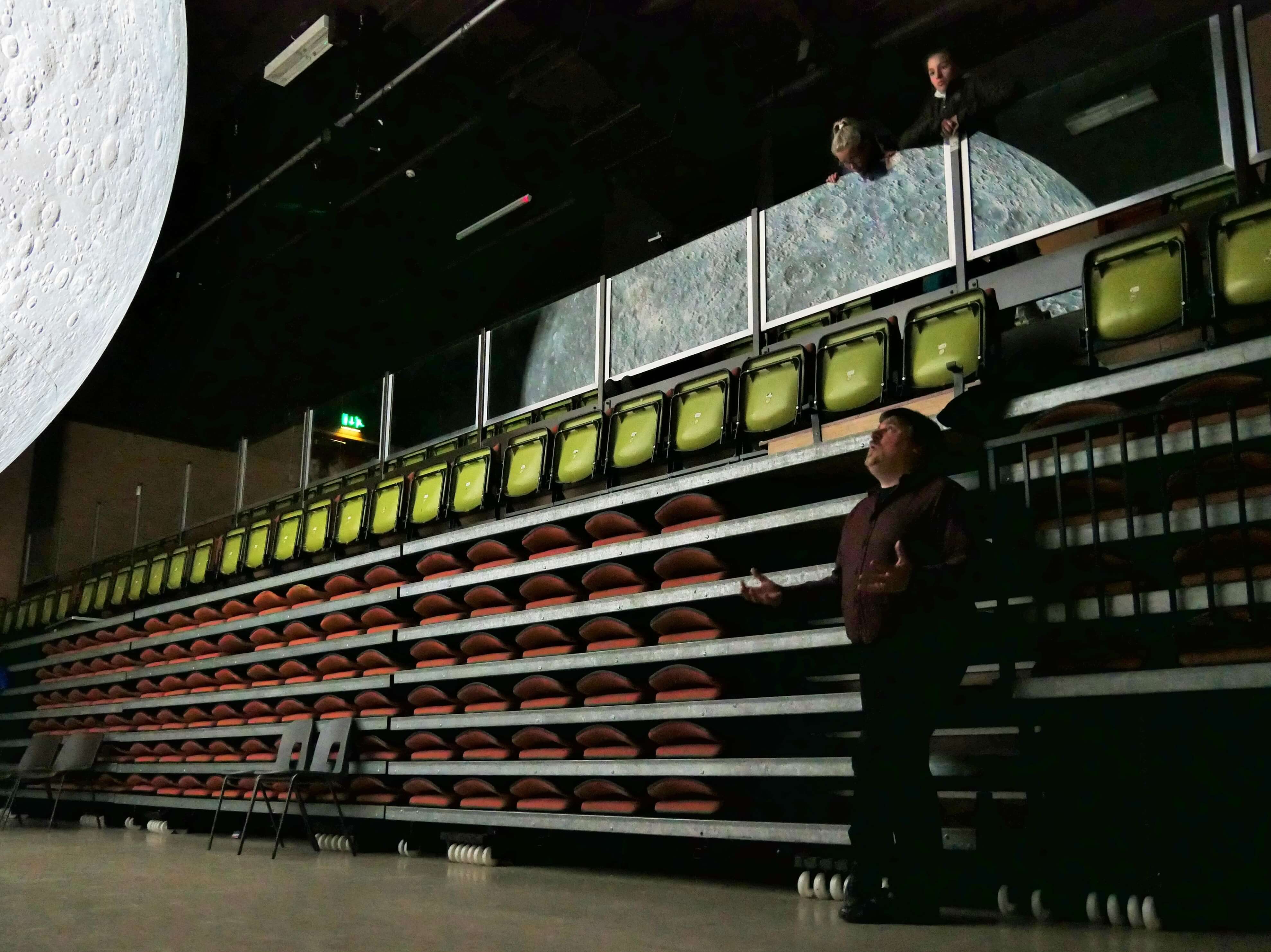 Native Orcadian storyteller Tom Muir tells stories under the moon, Stromness, Orkney Islands, Scotland, UK