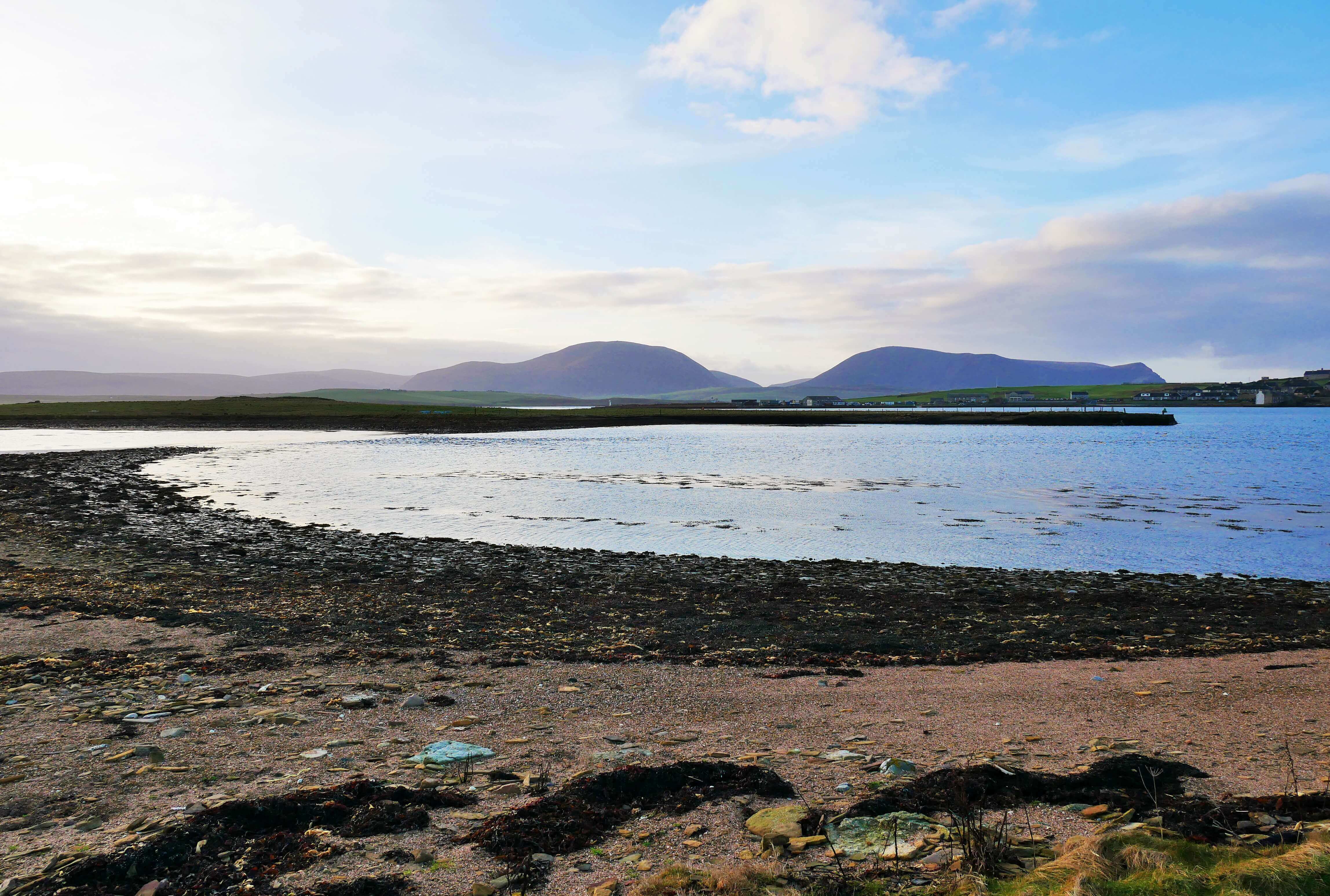 Causeway leading from Inner Holm to Outer Holm at low tide, Stromness, Orkney Islands, Scotland, UK.