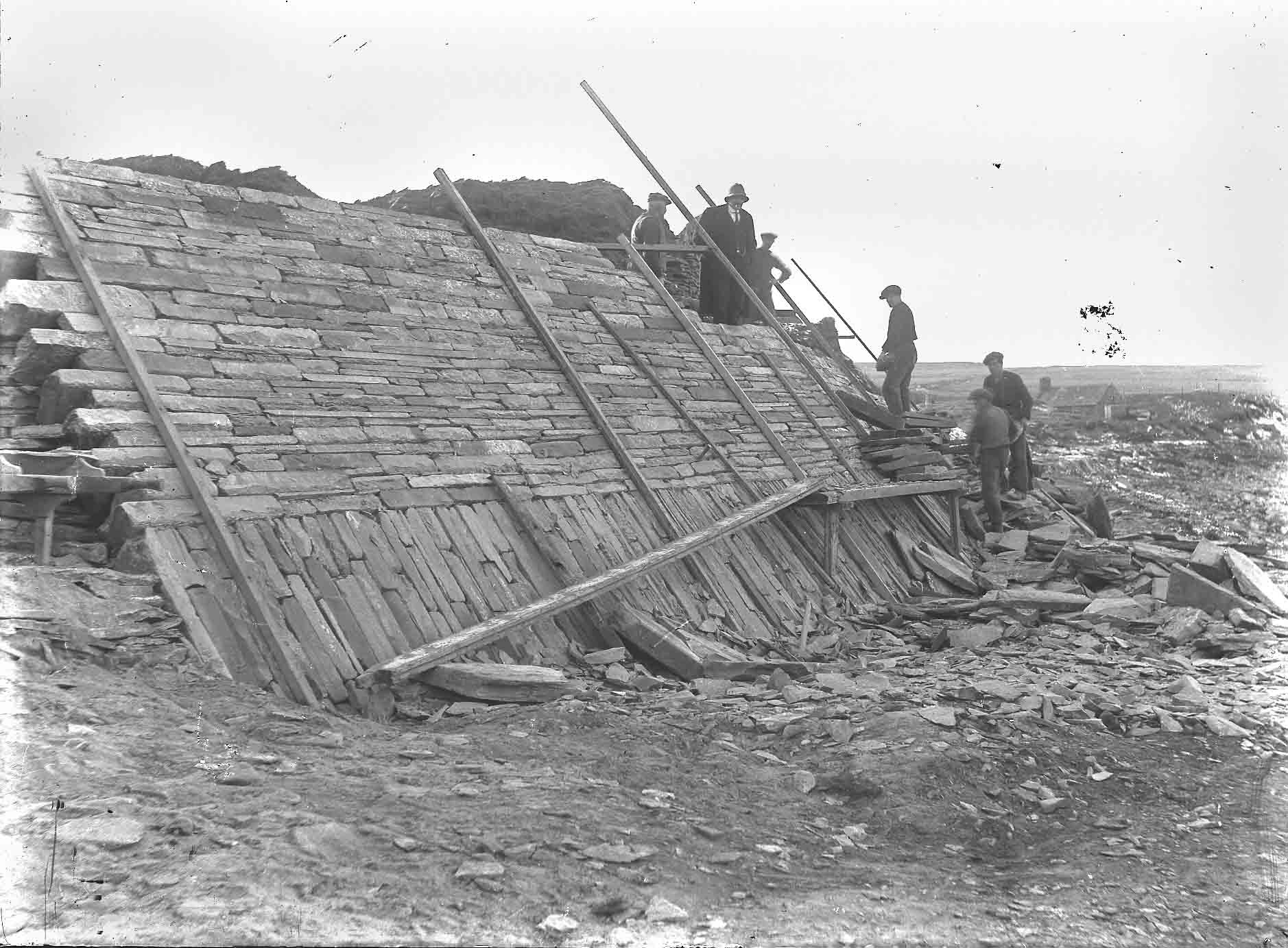 The sea wall being built Old photo of the Gordon Childe archaeological dig of the Neolithic Village found on Skaill Beach, Sandwick, Orkney Islands, Scotland, UK. #Orkneyology.com